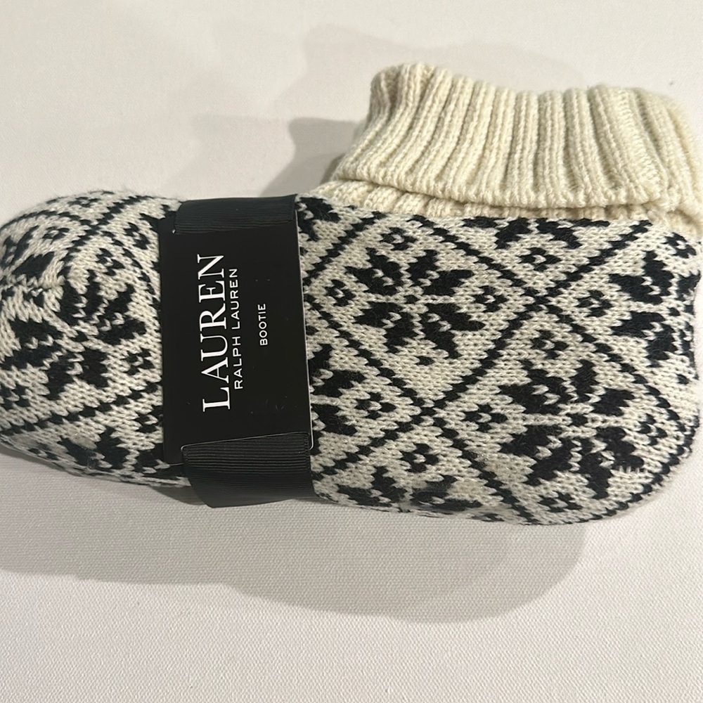 Ralph Lauren Bootie with plush Sherpa lining for luxurious comfort.